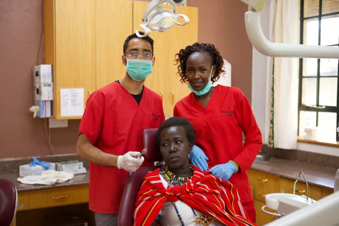 Dentist, Assistant and patient in dental clinic